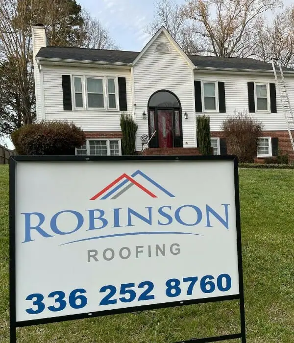 House getting a roof replacement by Robinson Roofing